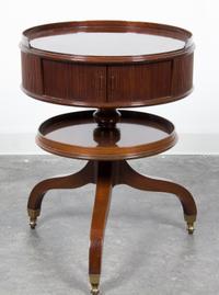 A Georgian Style Mahogany Drum Table Height 29 x diameter 21 3/4 inches. — 20TH CENTURY