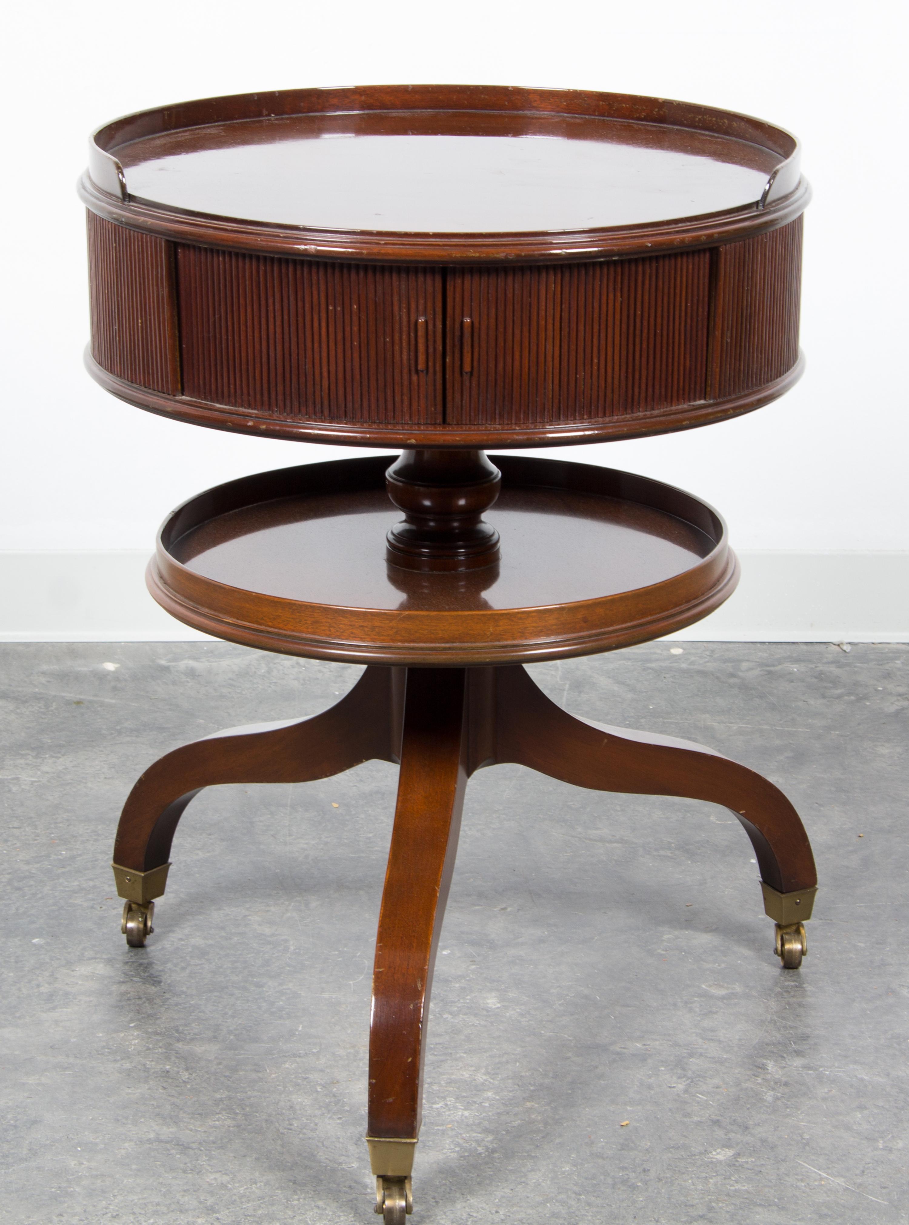 A Georgian Style Mahogany Drum Table Height 29 x diameter 21 3/4 inches. — 20TH CENTURY