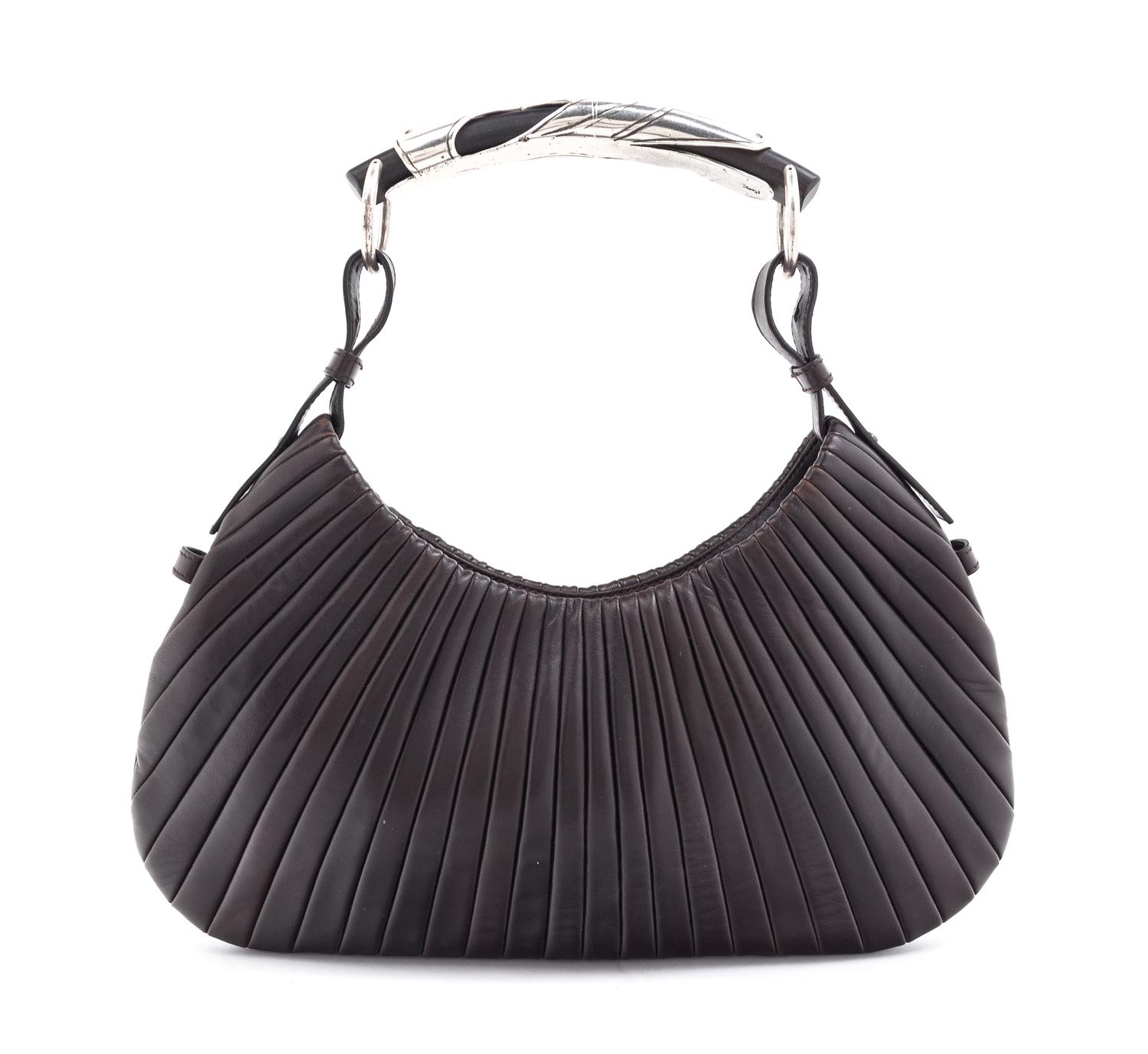An Yves Saint Laurent Brown Leather Mombasa Handbag, 14" x 6" x .5".