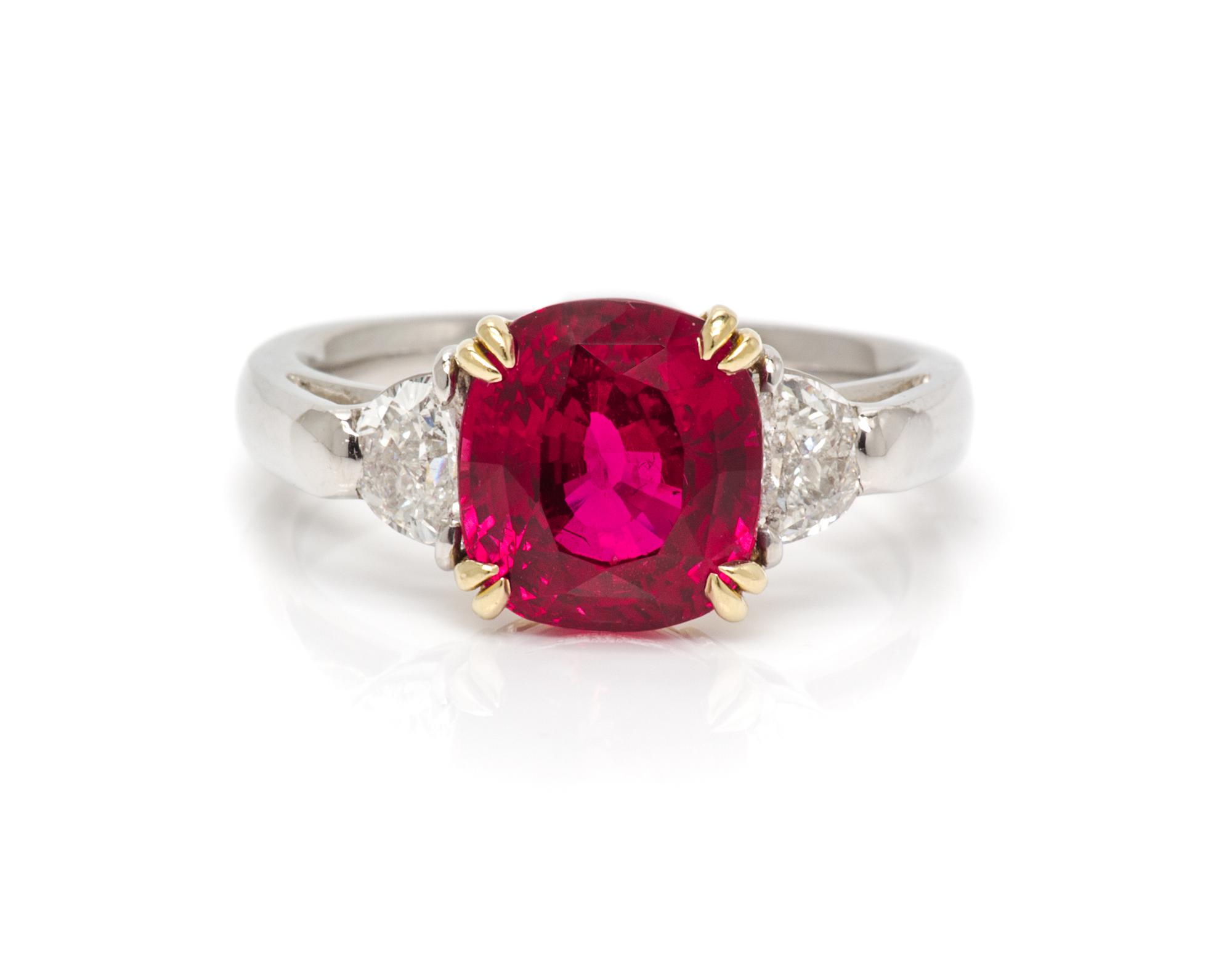 A Platinum, 18 Karat Yellow Gold, Ruby and Diamond Ring, 5.00 dwts.