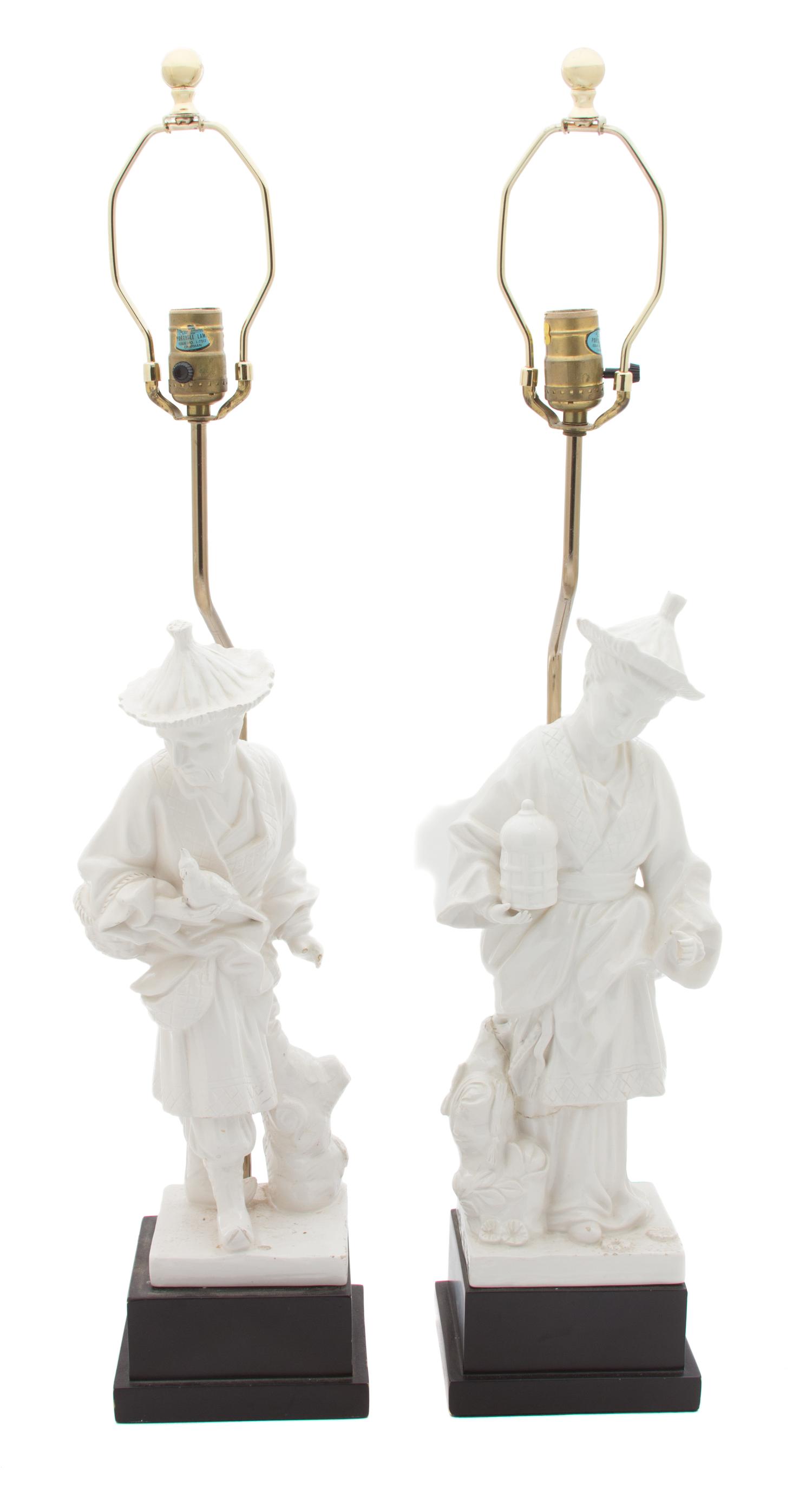 A Pair of Chinese Blanc-de-Chine Porcelain Figures Height overall 34, height of figures 17 inches. — 20TH CENTURY