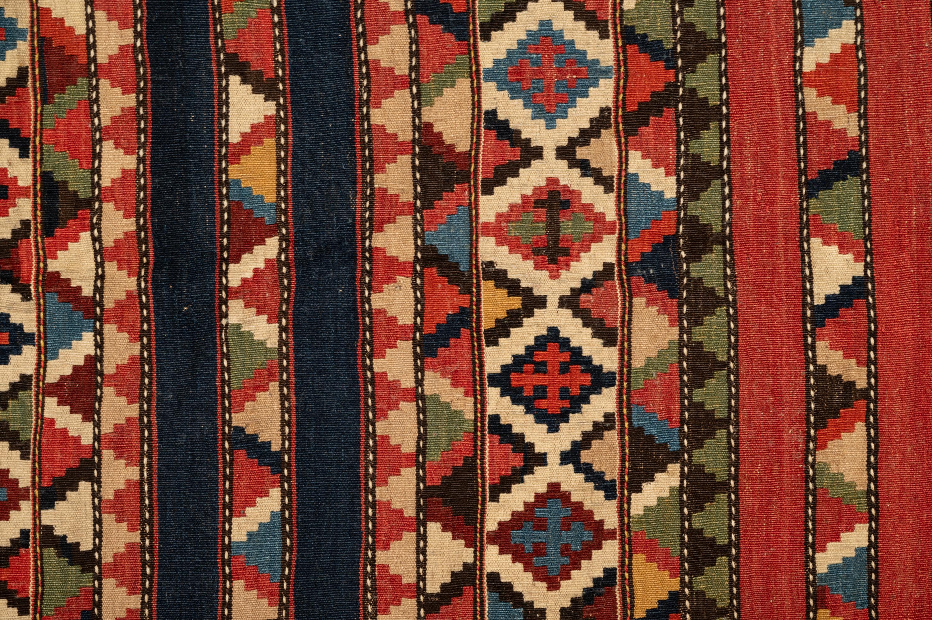 A Group of Three Kilim Rugs