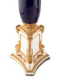 A Pair of Empire Gilt Bronze Mounted Porcelain Six-Light Candelabra