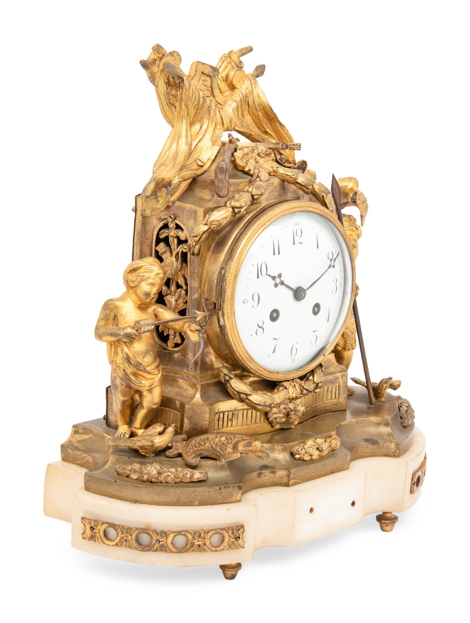 RELEASED TO OWNER - A French Gilt Bronze and Marble Mantel Clock
