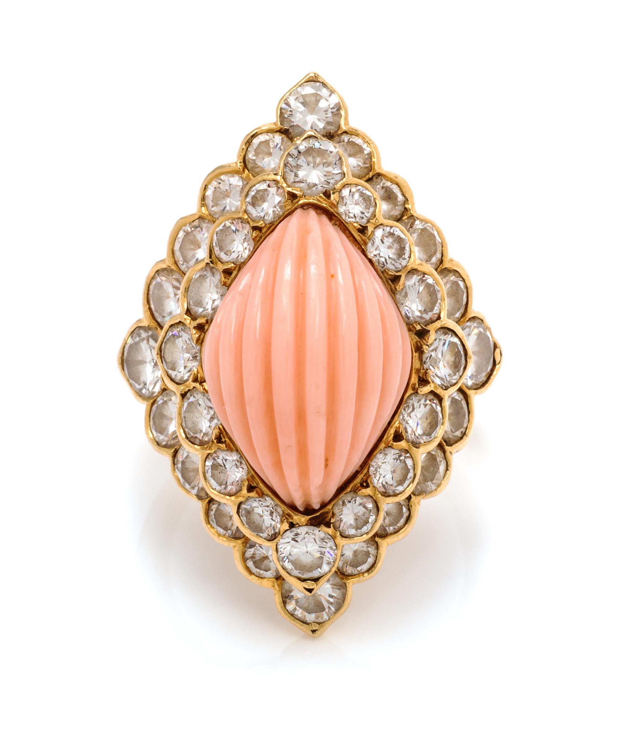 An 18 Karat Yellow Gold, Angel Skin Coral, and Diamond Ring, Andre Vassort for Boucheron, 6.70 dwts.