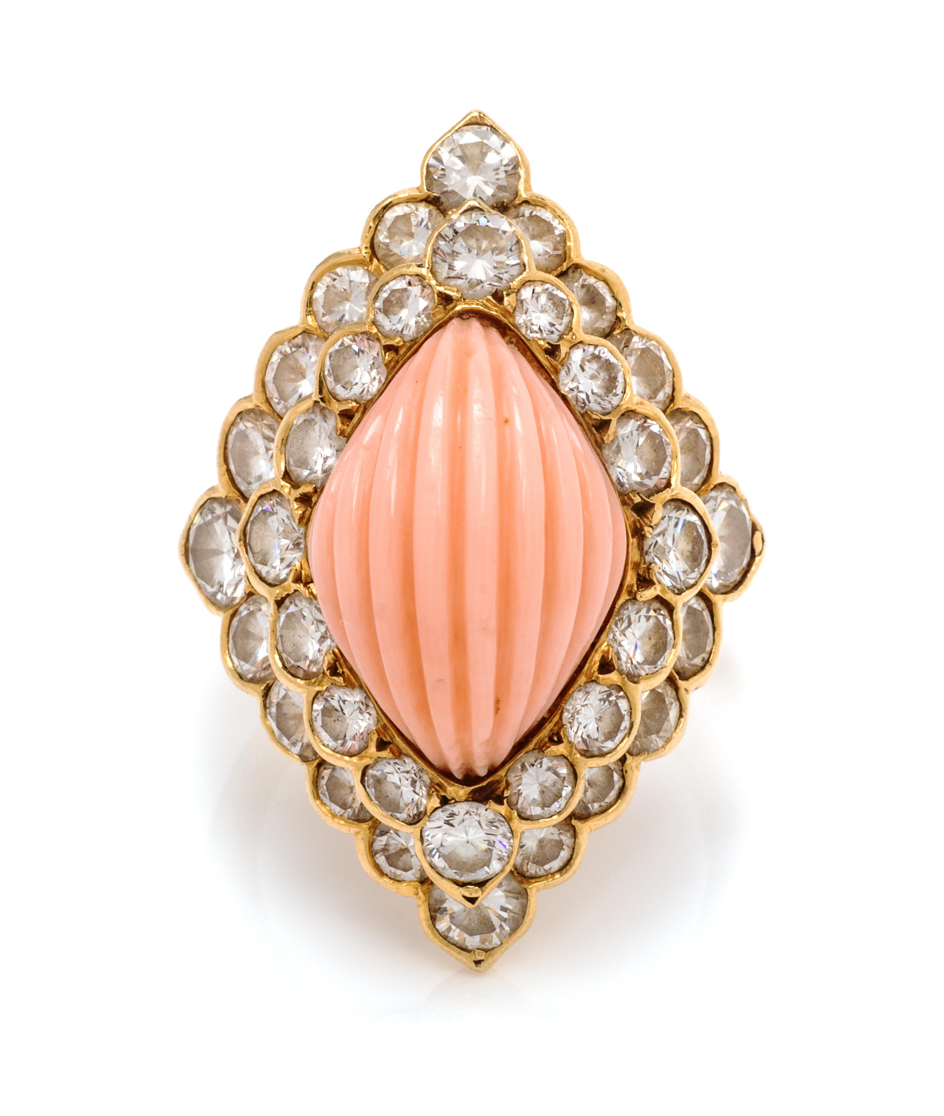 An 18 Karat Yellow Gold, Angel Skin Coral, and Diamond Ring, Andre Vassort for Boucheron, 6.70 dwts.