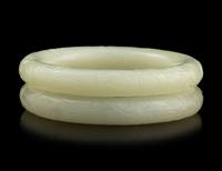 A Pair of Carved White Jade Bangles
