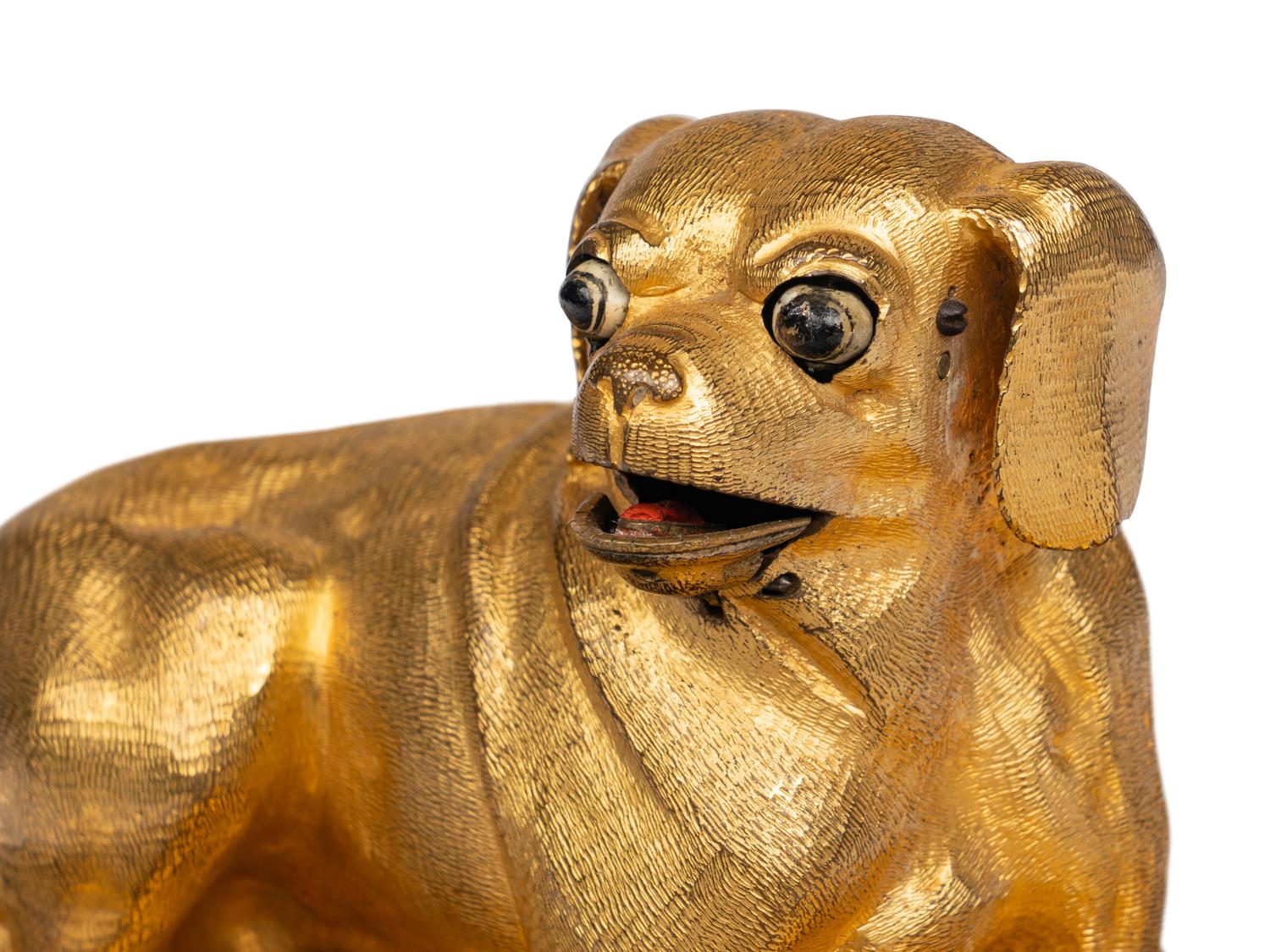 A German Gilt Bronze, Ebonized and Lapis Lazuli-Mounted Automaton with a Reclining Hound