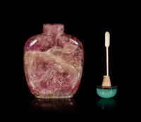 A Tourmaline 'Dragon and Phoenix' Snuff Bottle