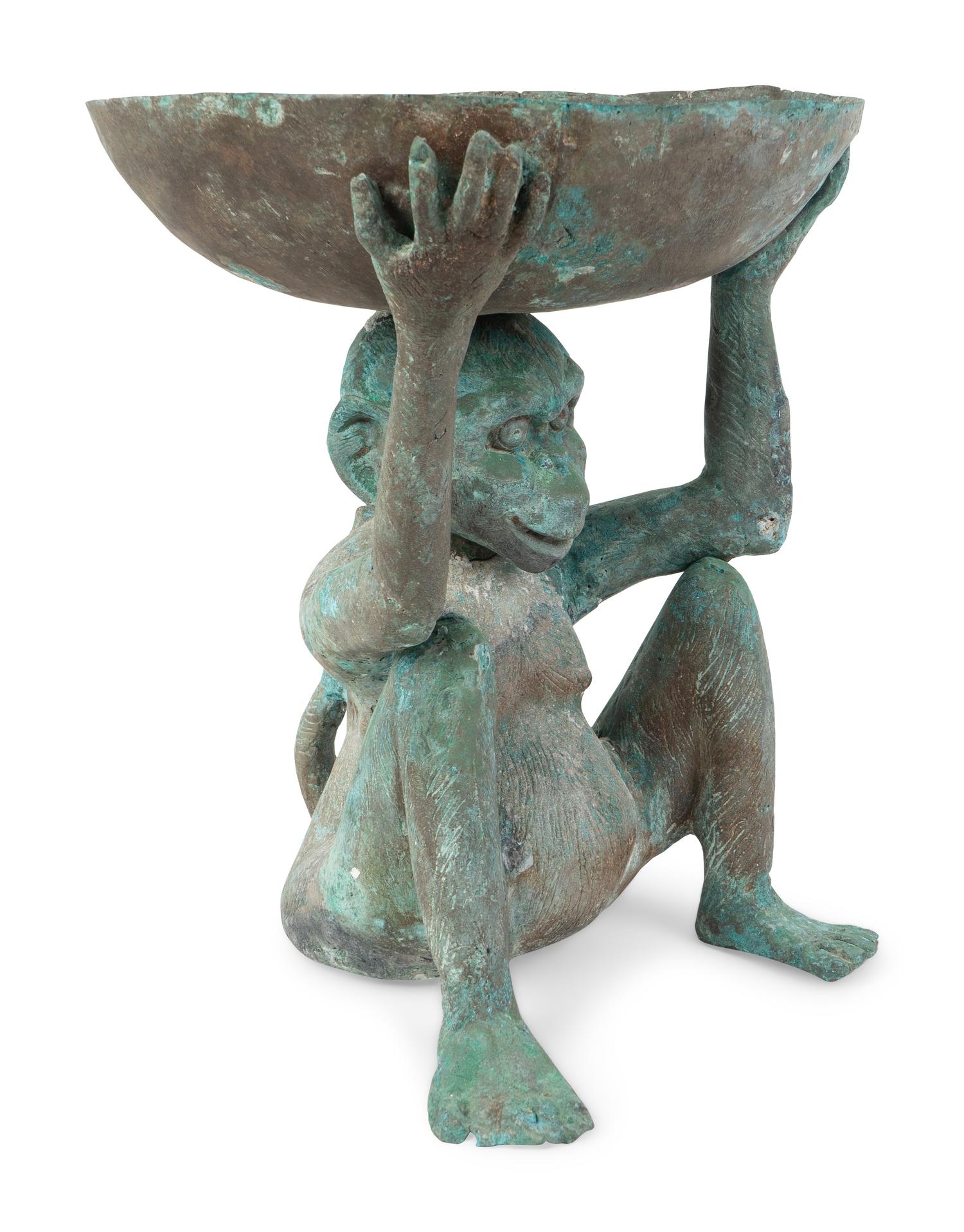 A Southeast Asian Carved Patinated Metal Bowl Supported by a Seated Monkey — 20TH CENTURY
