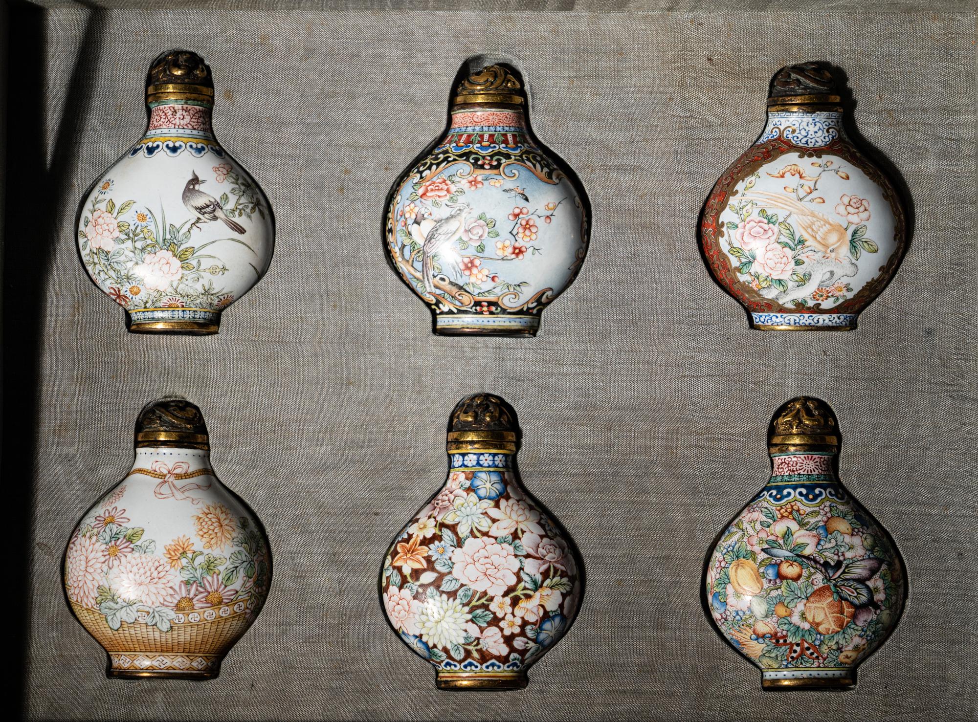 A Set of Six Peking Enamel on Copper Snuff Bottles
