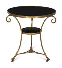A French Empire Style Gilt Bronze and Black Granite Gueridon Table