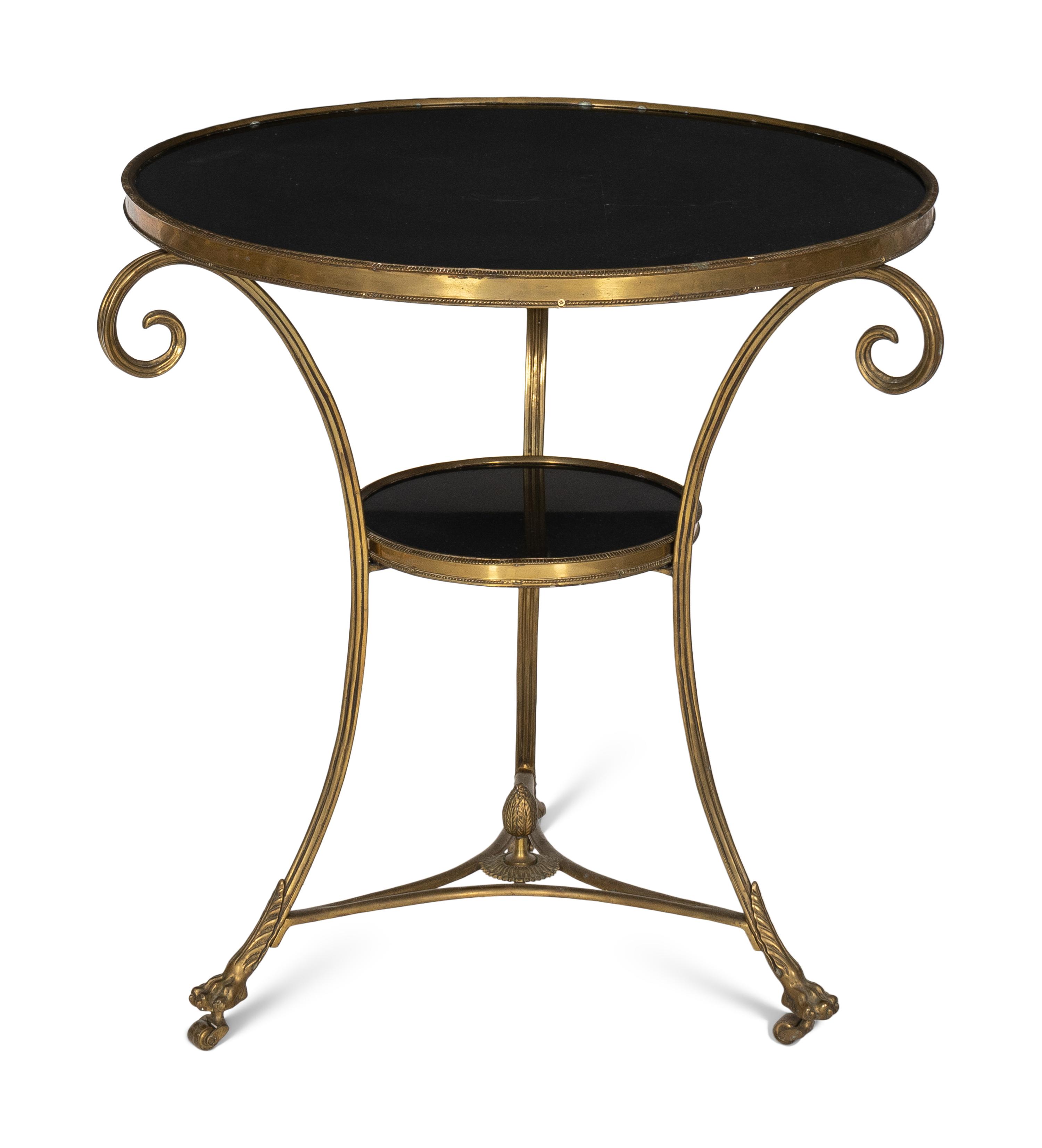A French Empire Style Gilt Bronze and Black Granite Gueridon Table