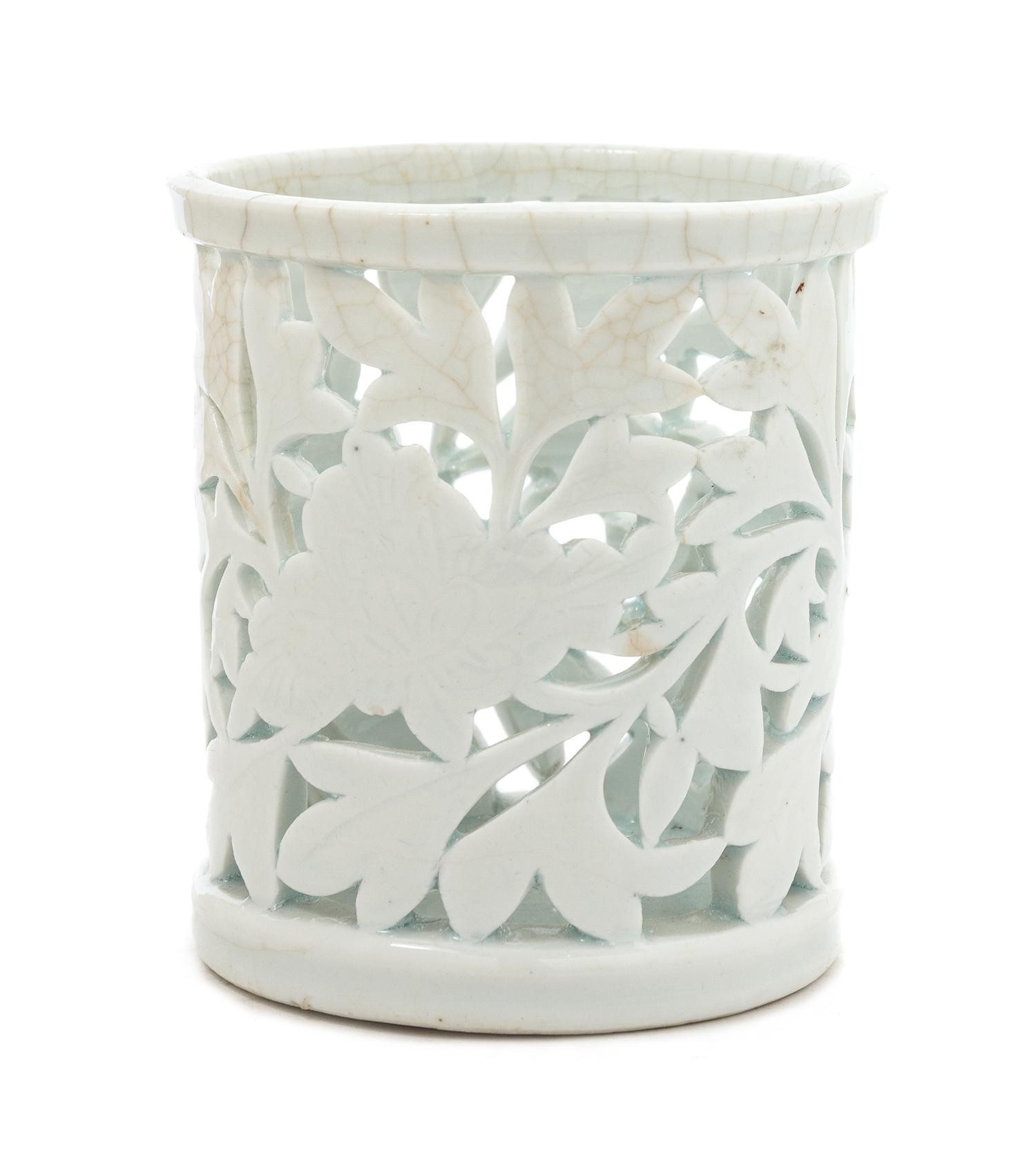 A Chinese Dehua Reticulated Porcelain Brush Holder 17TH/18TH CENTURY Height 4 1/4 inches. — 17TH/18TH CENTURY