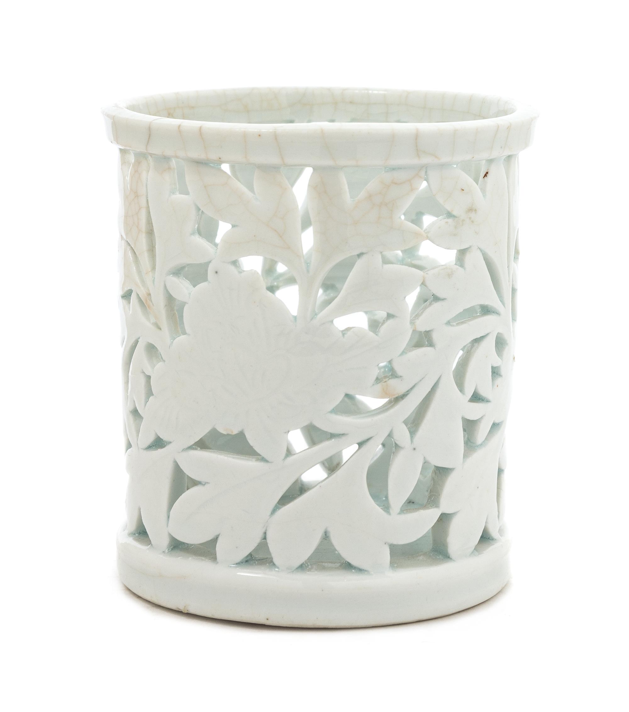 A Chinese Dehua Reticulated Porcelain Brush Holder 17TH/18TH CENTURY Height 4 1/4 inches. — 17TH/18TH CENTURY