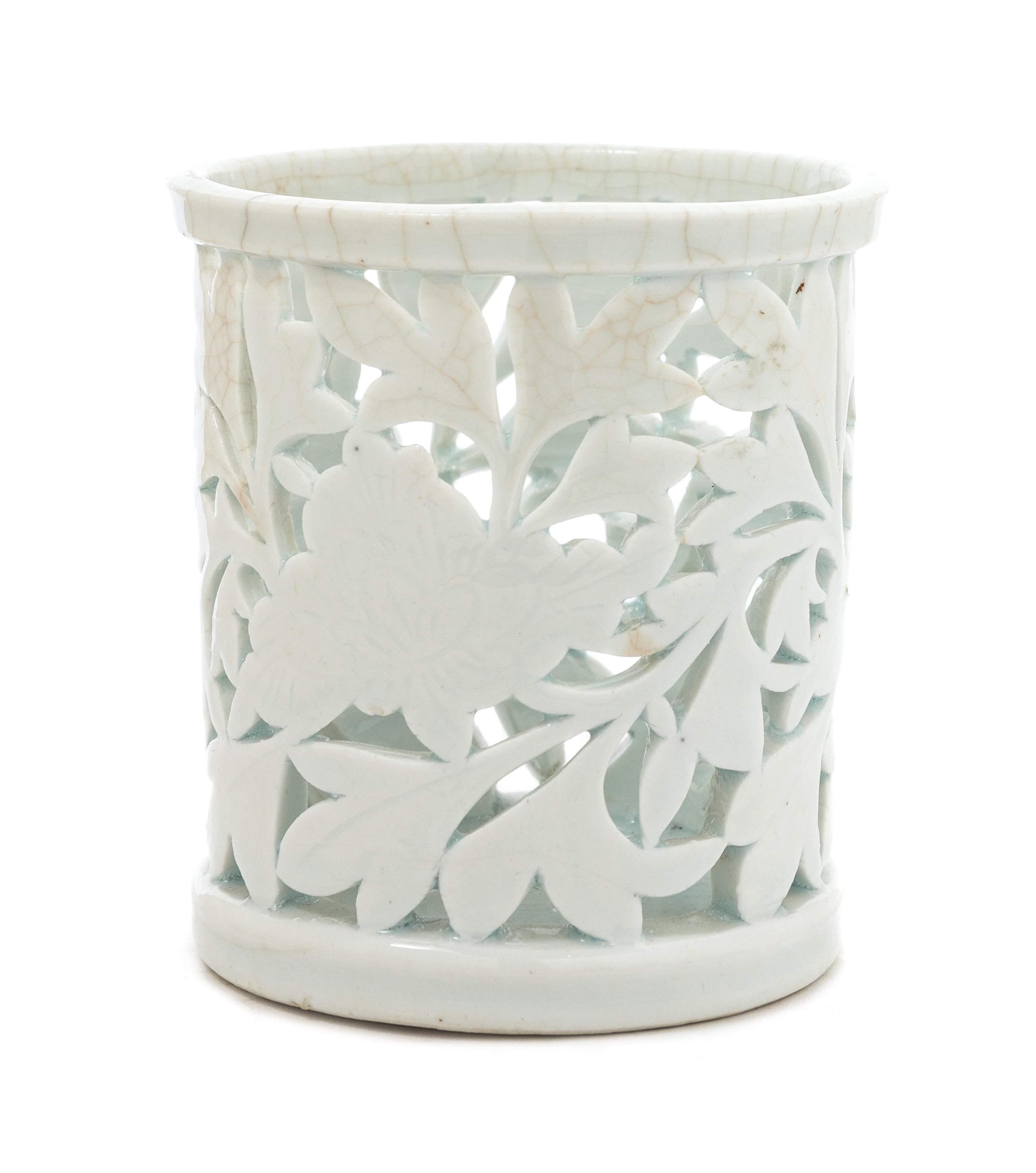 A Chinese Dehua Reticulated Porcelain Brush Holder 17TH/18TH CENTURY Height 4 1/4 inches. — 17TH/18TH CENTURY