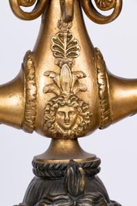 A Pair of Empire Style Gilt and Patinated Bronze Six-Light Figural Candelabra