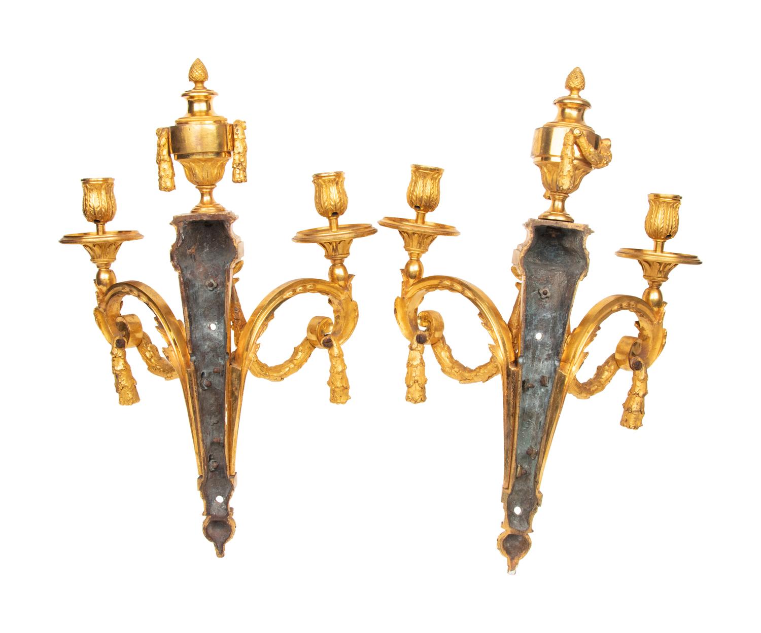 A Pair of Louis XV/XVI Transitional Gilt Bronze Two-Light Wall Sconces