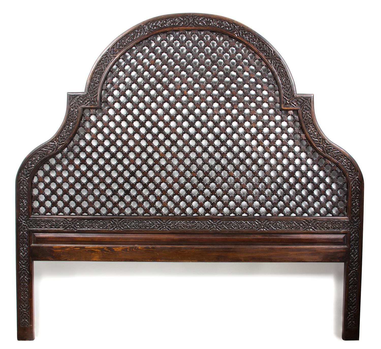 An Indian Carved Wood Queen Headboard Height 74 x width 79 inches.