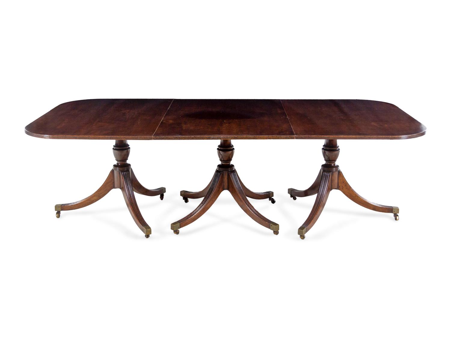 A George III Style Mahogany Triple-Pedestal Dining Table