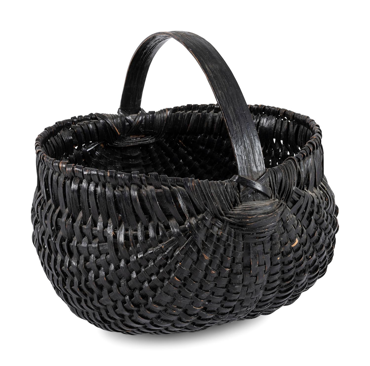 A Woven Buttocks Basket in Black Paint