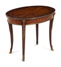 A Continental Marquetry and Gilt Metal Mounted Low Table