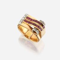 A Retro ruby, diamond, eighteen karat gold, and platinum ring
