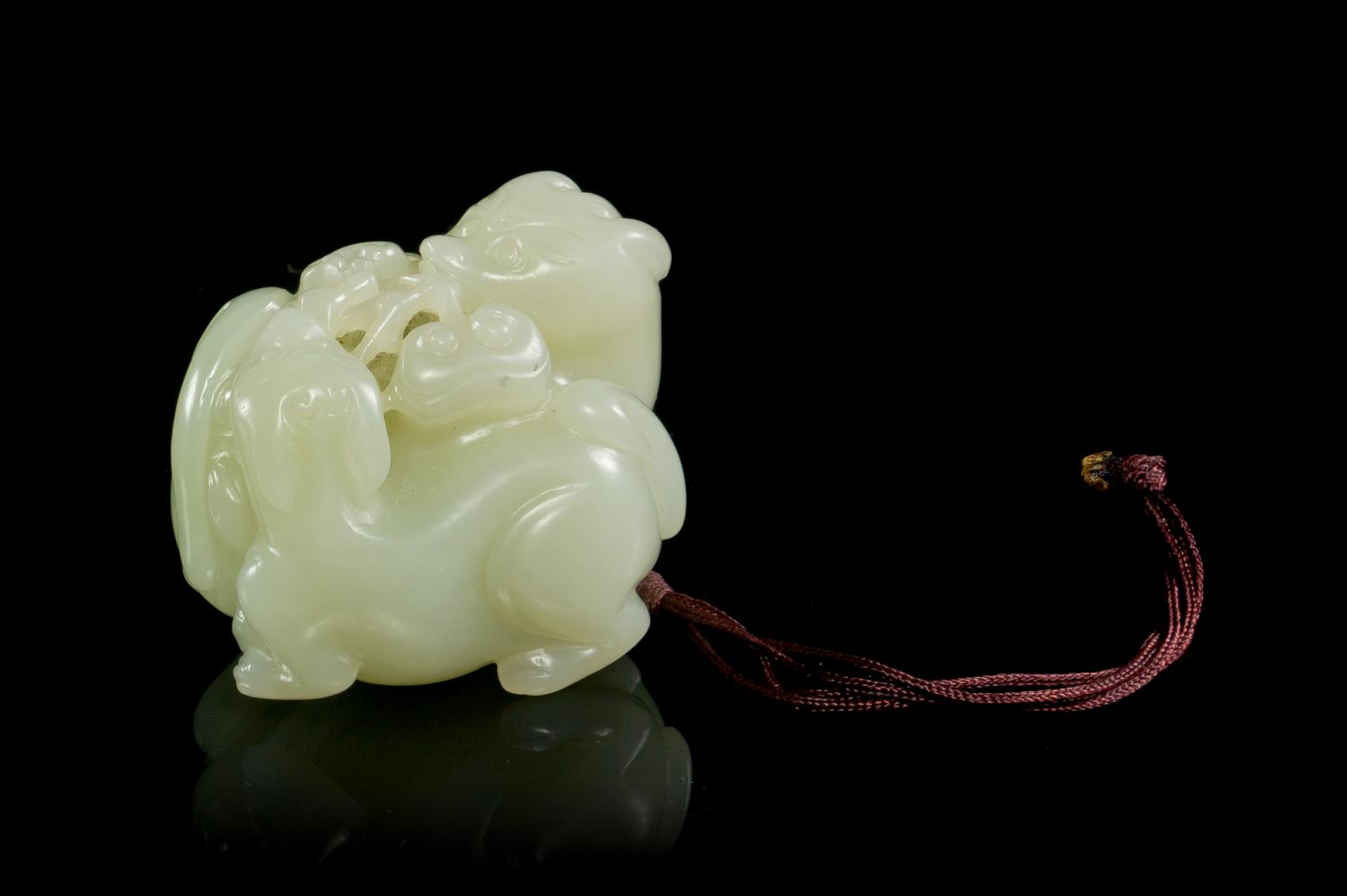 A Pale Celadon Jade Toggle Width 1 3/4 inches.