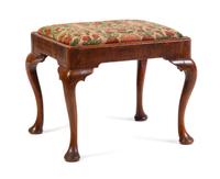 A Queen Anne Walnut Stool Height 18 x width 21 x depth 17 inches. — CIRCA 1720
