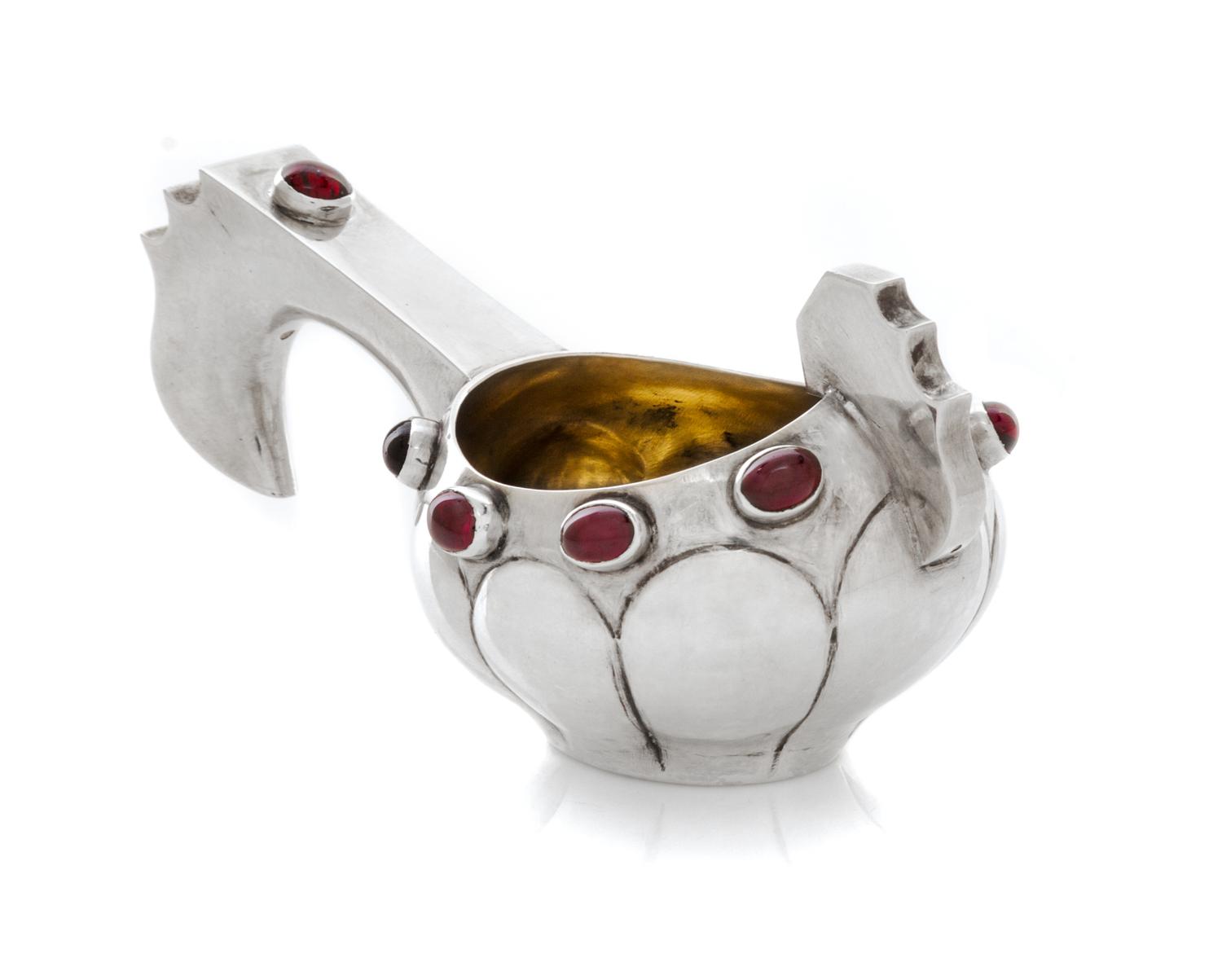 A Russian Silver and Jeweled Kovsh, Mark of K. Faberge, kokoshnik mark obscured, late 19th/early 20th century, having a lobed body, the