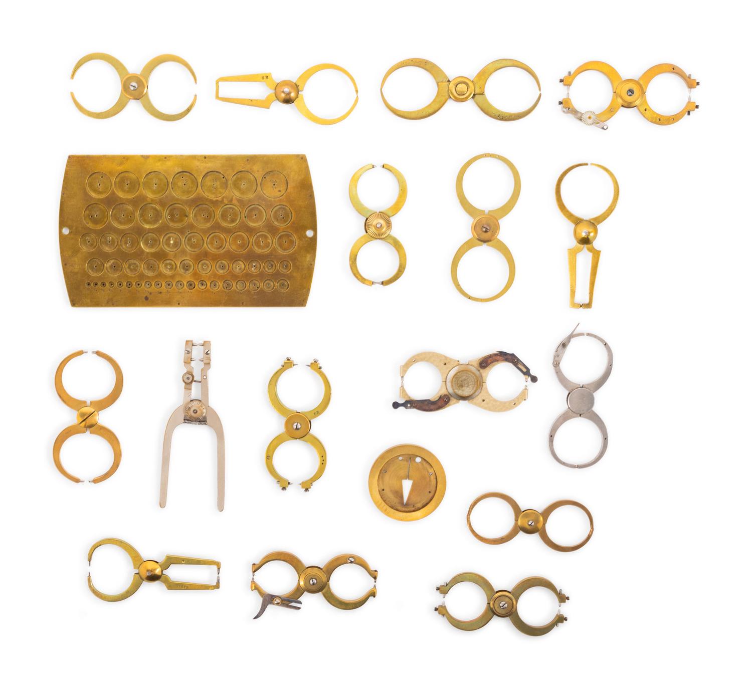 A Collection of Watch Maker's Bench Tools and Accessories