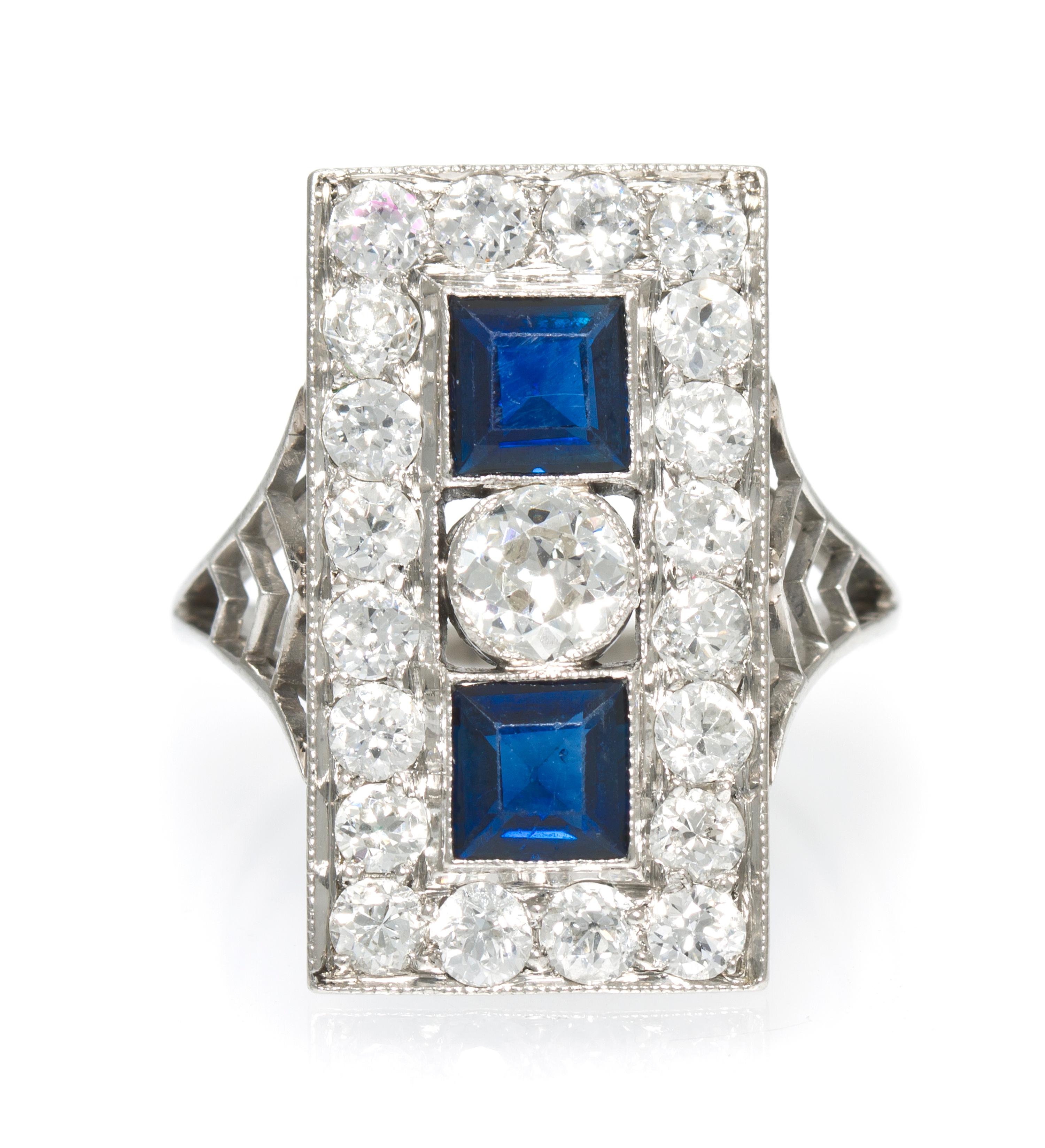 An Art Deco Platinum, Diamond and Sapphire Ring, 2.55 dwts.