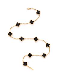 VAN CLEEF & ARPELS, YELLOW GOLD AND ONYX 'VINTAGE ALHAMBRA' NECKLACE