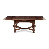 A Baroque Style Oak Draw-Leaf Dining Table