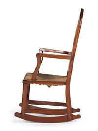 A Federal Heart and Urn Carved Mahogany Rush-Seat Rocking Chair