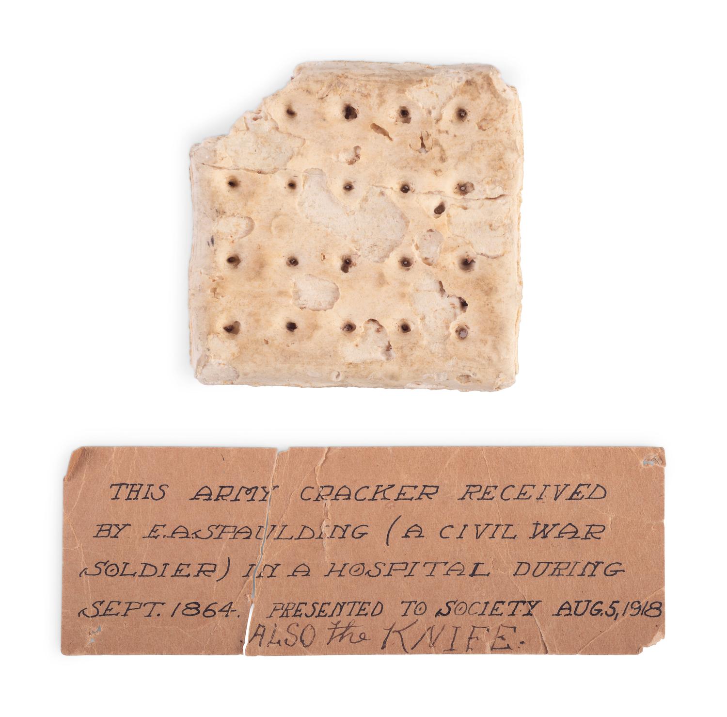 Civil War hardtack received by identified veteran in September 1864 with historical society tag.