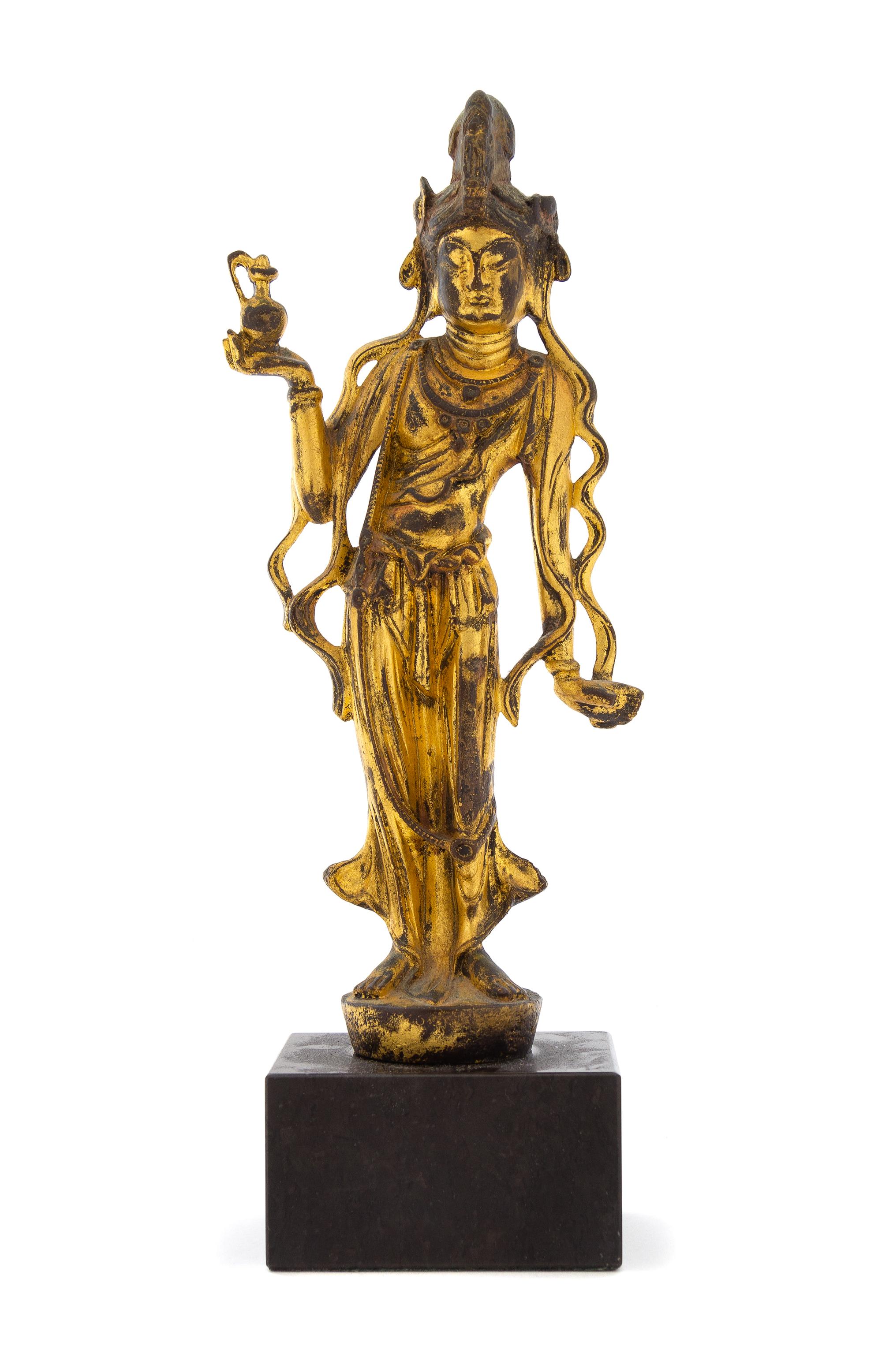 A Gilt Bronze Figure of a Guanyin Height 9 1/8 inches. — MODERN