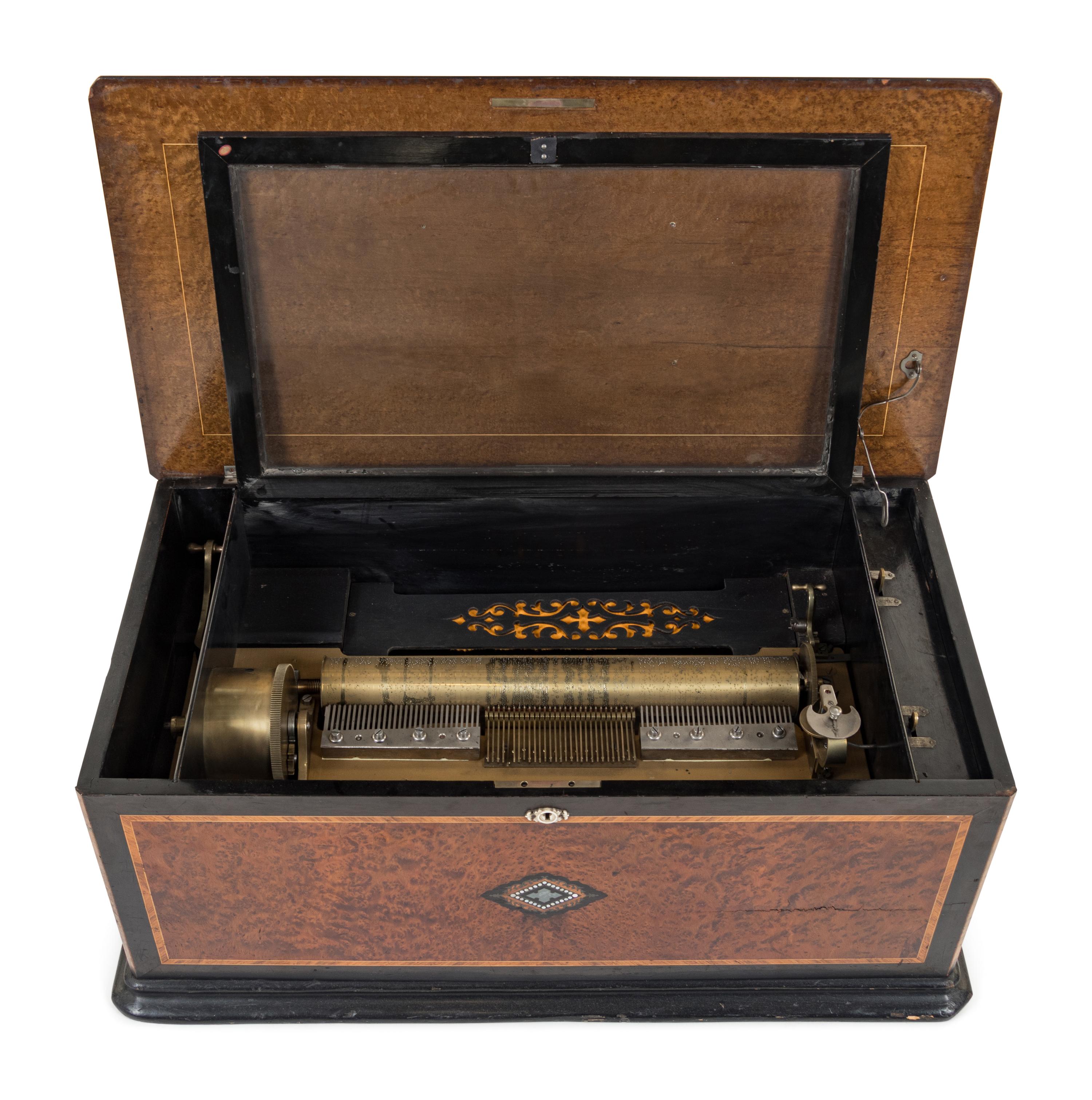A Swiss Parcel Ebonized Cylinder Music Box