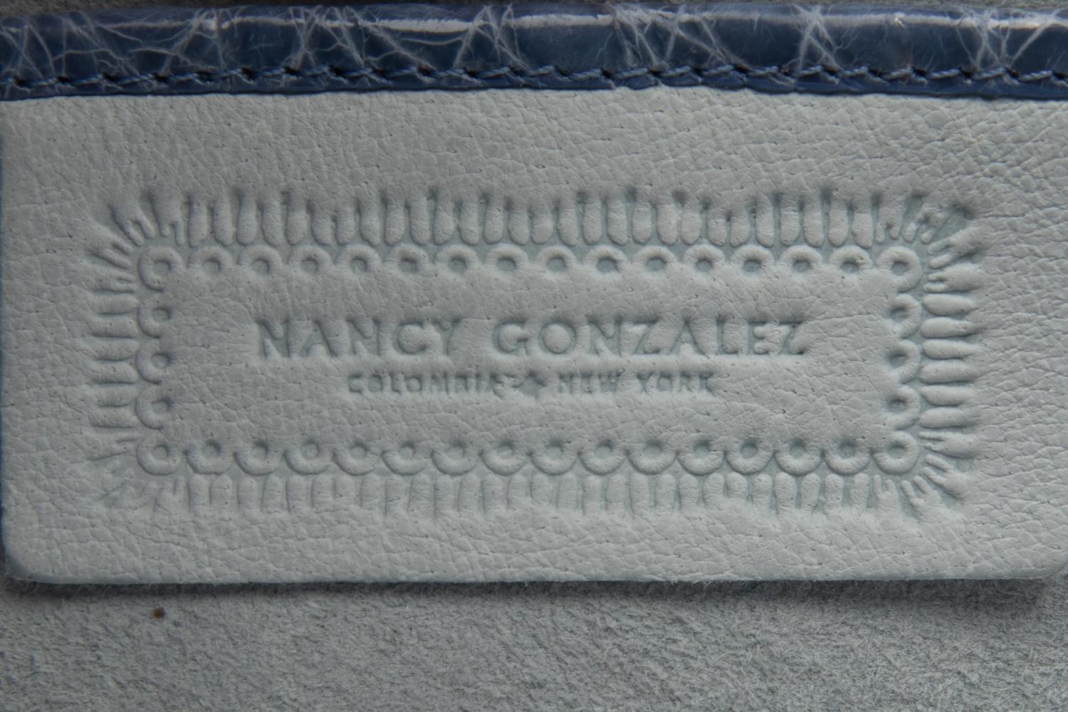 Four Nancy Gonzalez Accessories