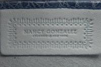 Four Nancy Gonzalez Accessories