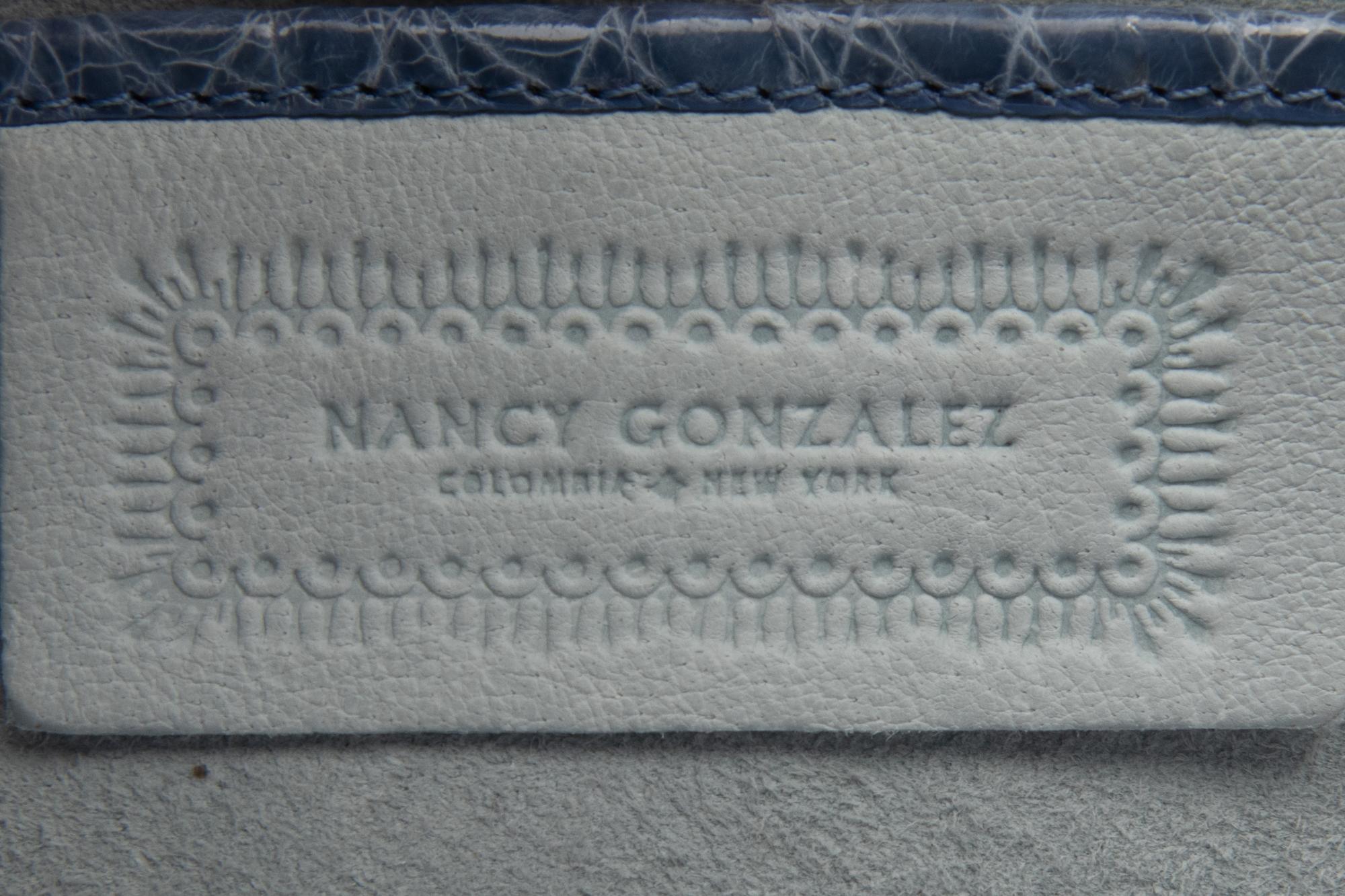 Four Nancy Gonzalez Accessories