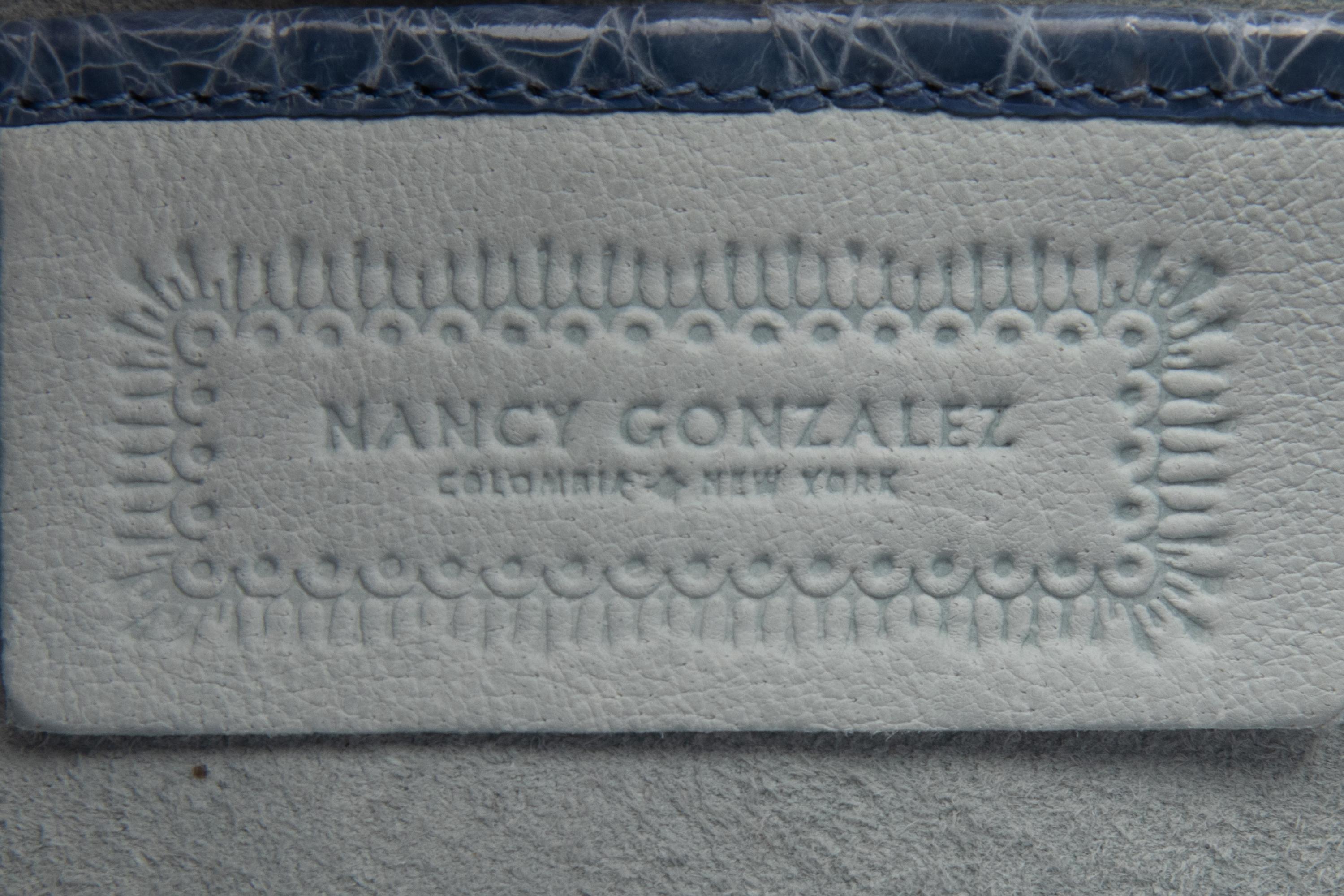 Four Nancy Gonzalez Accessories