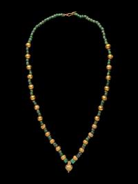 A Greek Gold, Emerald, and Glass Necklace with an Amphora-Shaped Pendant