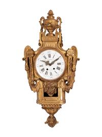 A Louis XVI Style Giltwood Cartel Clock