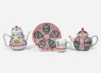 Two Chinese export famille rose porcelain teapots, a stand and a teacup, Yongzheng to early Qianlong period 粉彩茶壺兩件 及座子和茶杯 清 雍正至乾隆
