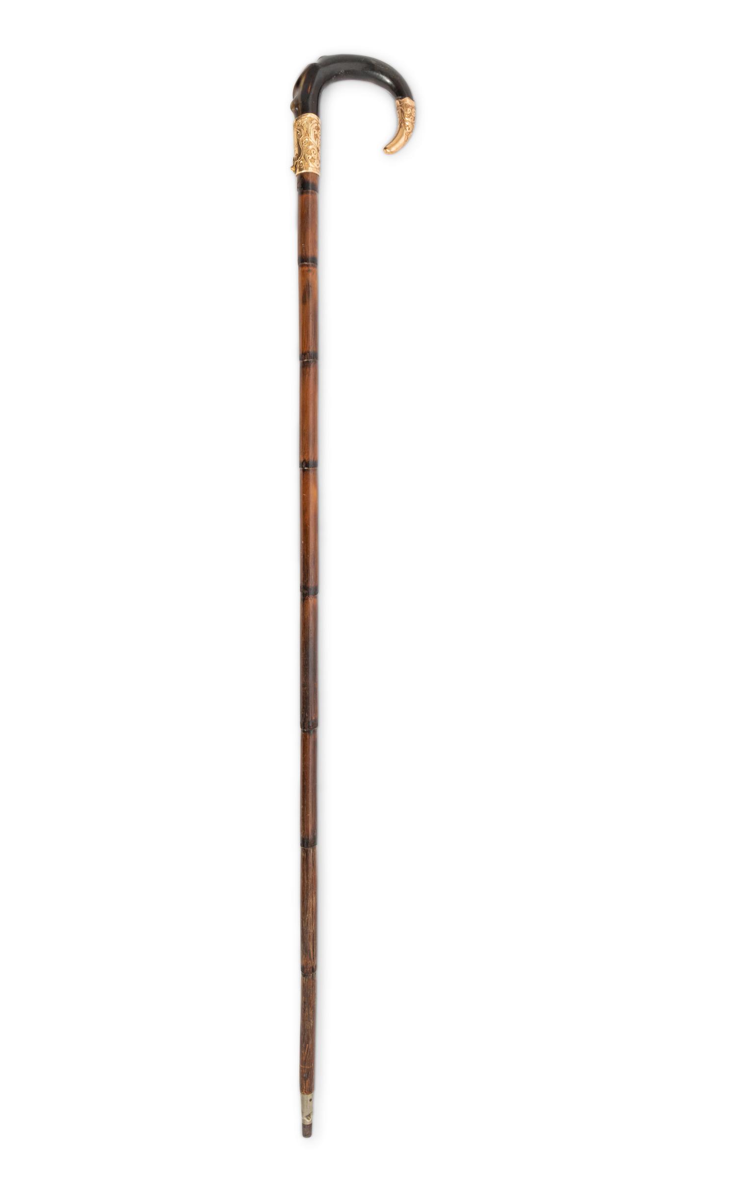 A 14-Karat Gold Mounted Stag Handle Cane