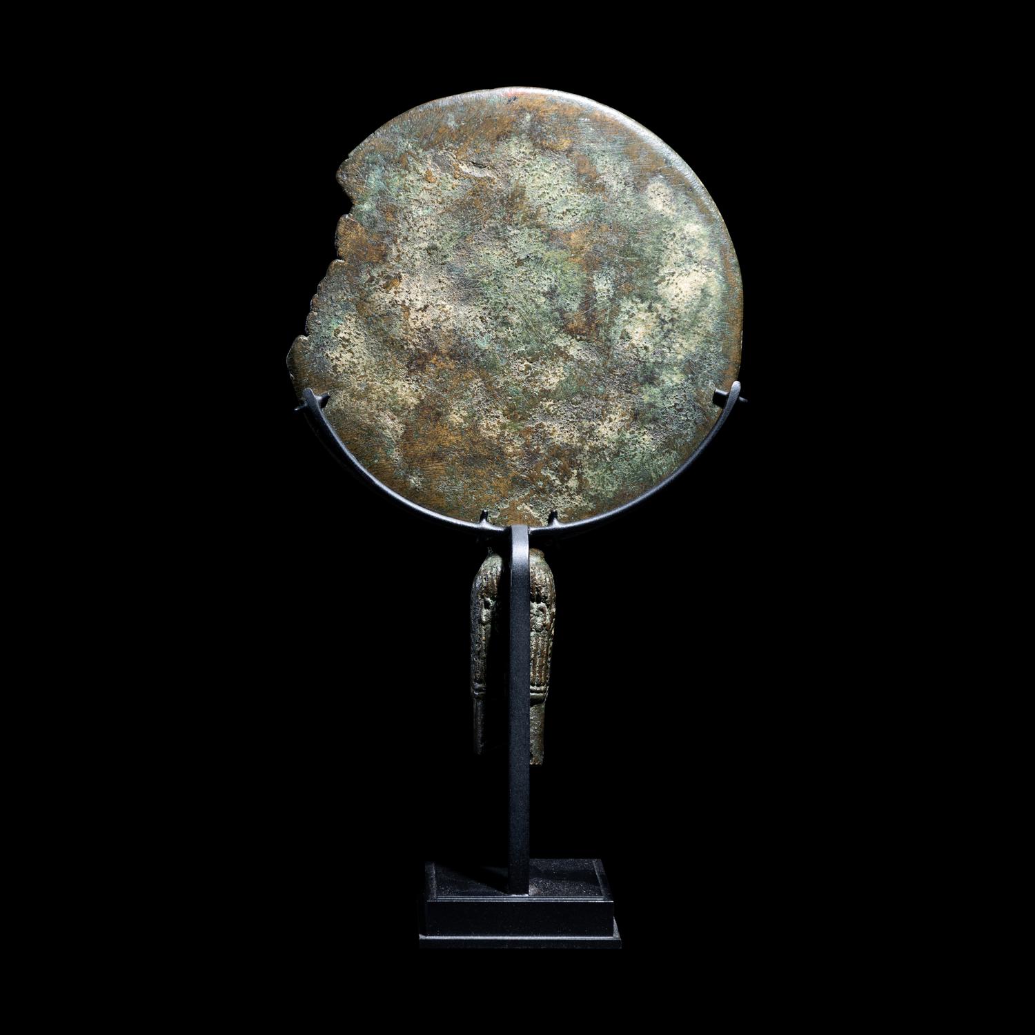 An Egyptian Bronze Mirror