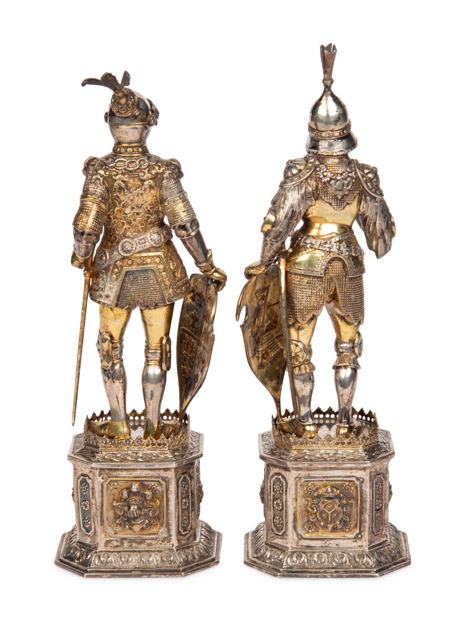 A Pair of German Silver and Parcel-Gilt Figures of Knights