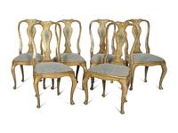 A Set of Six Italian Rococo Polychrome-Painted and Parcel-Gilt Dining Chairs