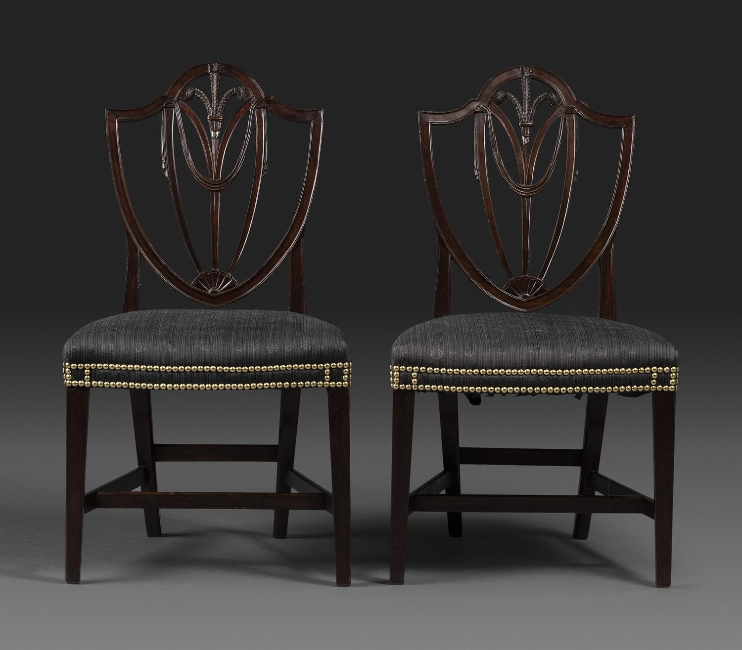 A Pair of Federal Carved Mahogany Shield-Back Dining Chairs